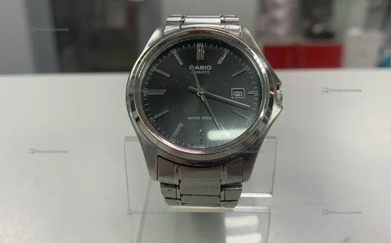 Часы  casioquartz