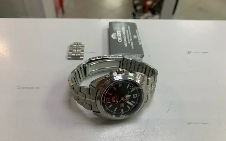 Часы  Orient em74