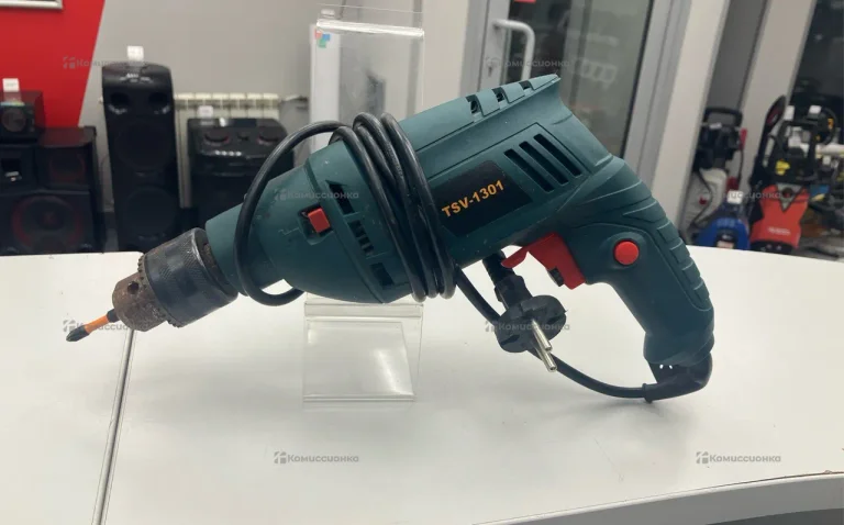 Ударная дрель 1301