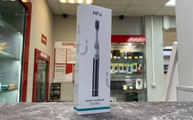 Электрическая зубная щетка