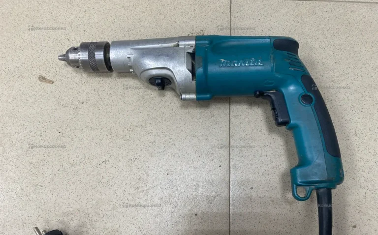 Дрель makita HP2050