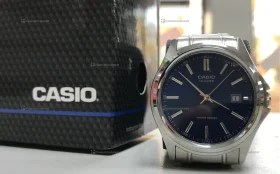 Часы  CASIO QUARTZ