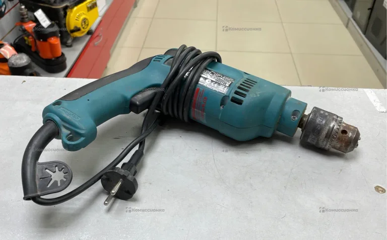 Дрель makita HP1620