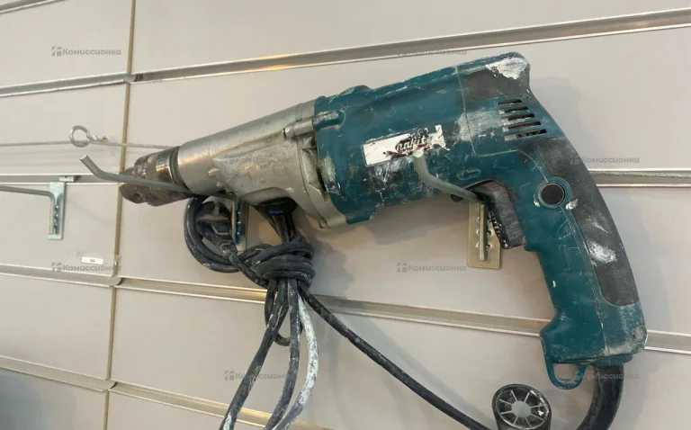 Дрель ударная HP 2050