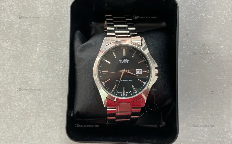 Часы  Casio QUARTZ