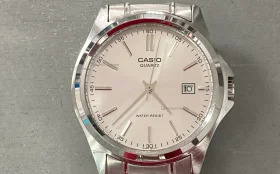 Часы  Casio QUARTZ