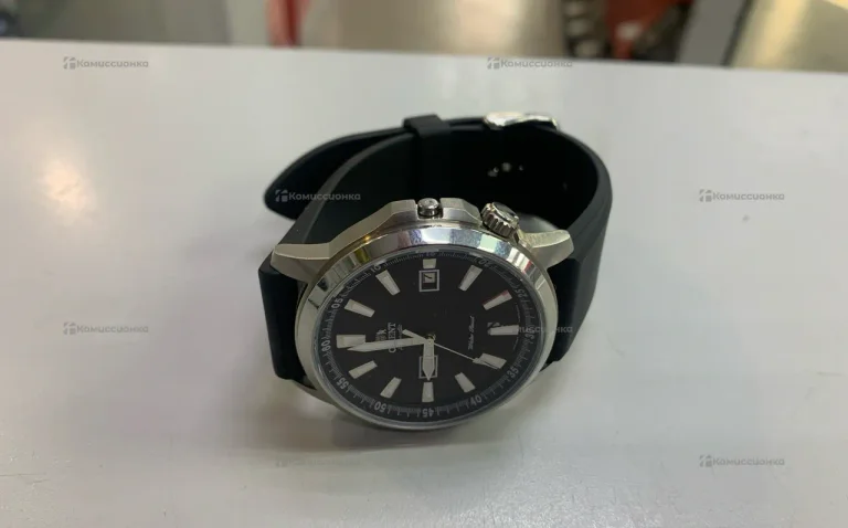 Часы  Orient em7k