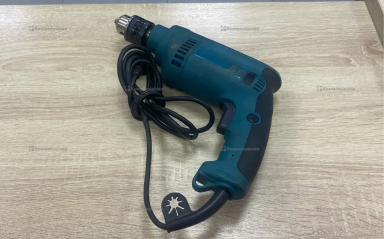 Дрель Ударная Makita hp1620