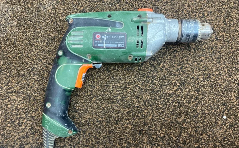 Дрель Калибр ДЭМР-1050ЕРУ