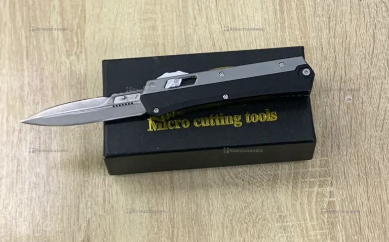 Нож выкидной