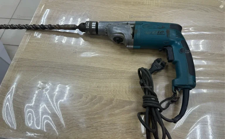 Дрель makita HP2050