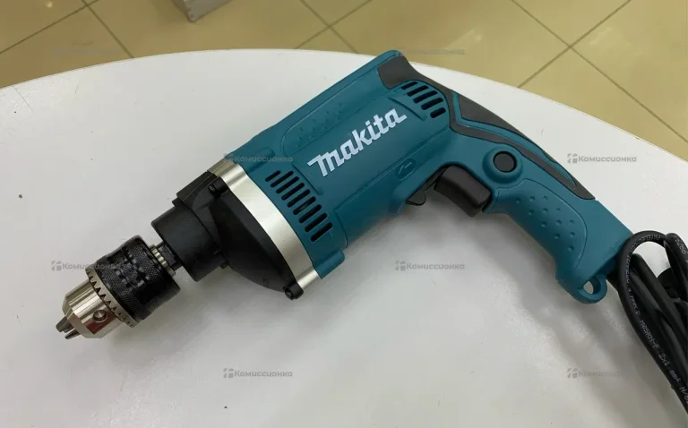 Ударная дрель Makita HP1630