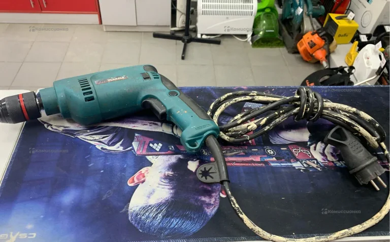 Дрель Makita hp1620