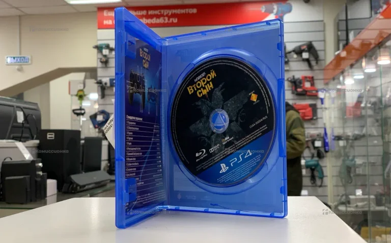 Приставка PS4. диск infamous