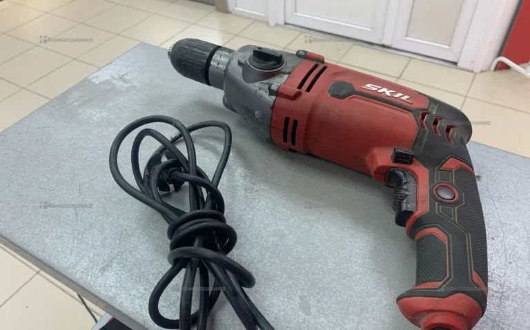 ударная дрель Skill 900w