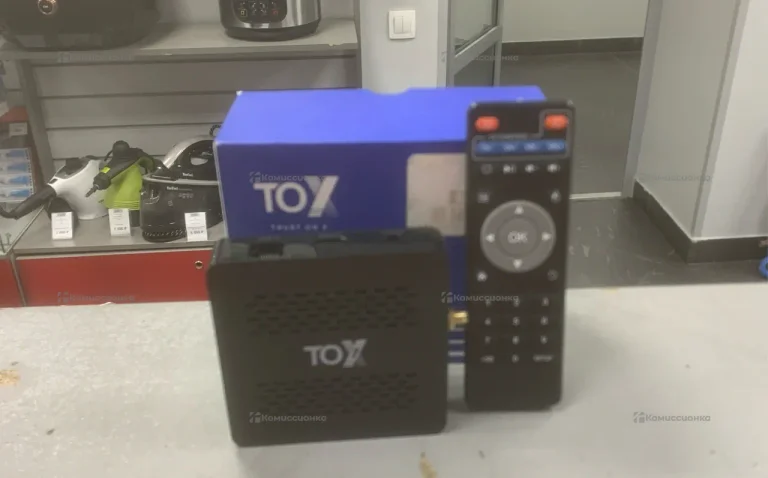 Тв приставка андроид Tox1