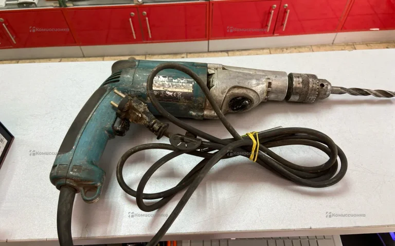 Дрель makita HP2050