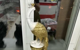 Статуя Павлина