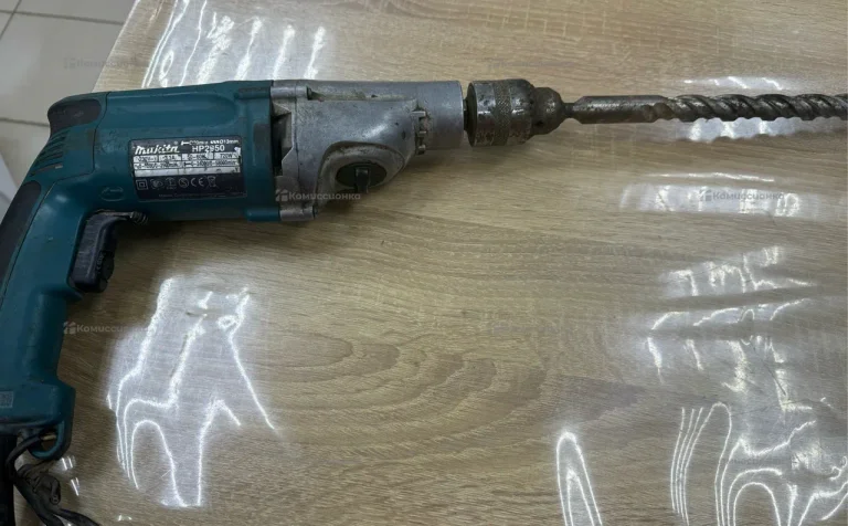 Дрель makita HP2050