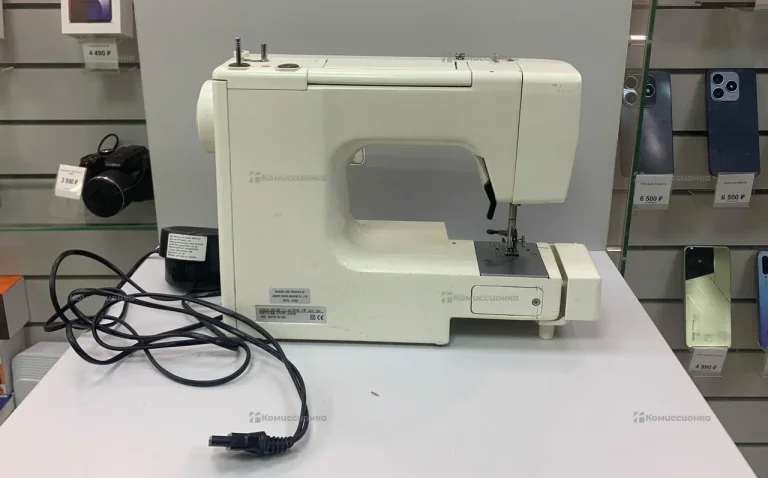 Швейная машина  Janome